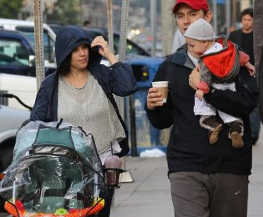 Neve with her current partner, John Joseph Field, and son Caspian